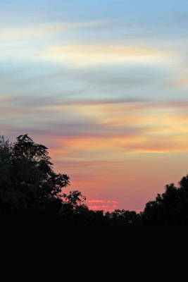 A colorful sunset caused by clouds of smoke on Friday, June 10, 2011.