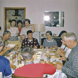 A photographic image of a holiday dinner at Herbert G. and Abbie Mae Neal's farm in 1968.