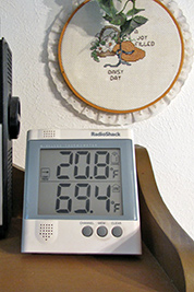 A photographic image of an indoor-outdoor thermometer.