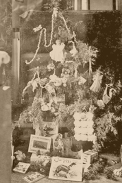 A photographic image of dolls on a Christmas Tree in 1888 in Russell county, Kansas.