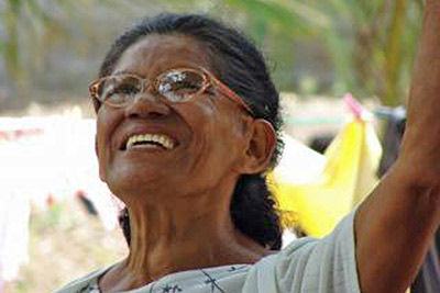 A photographic image of a joyful woman.
