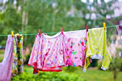 A photographic image of laundry drying on a clothesline.
