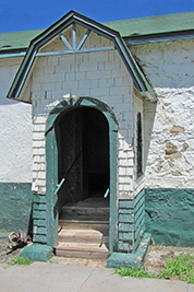 A photographic image of an entrance to one of the buildings at Fort Stanton, New Mexico.