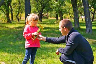 A photographic image of a father and his daughter.