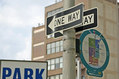 A photographic image of one-way street signs.